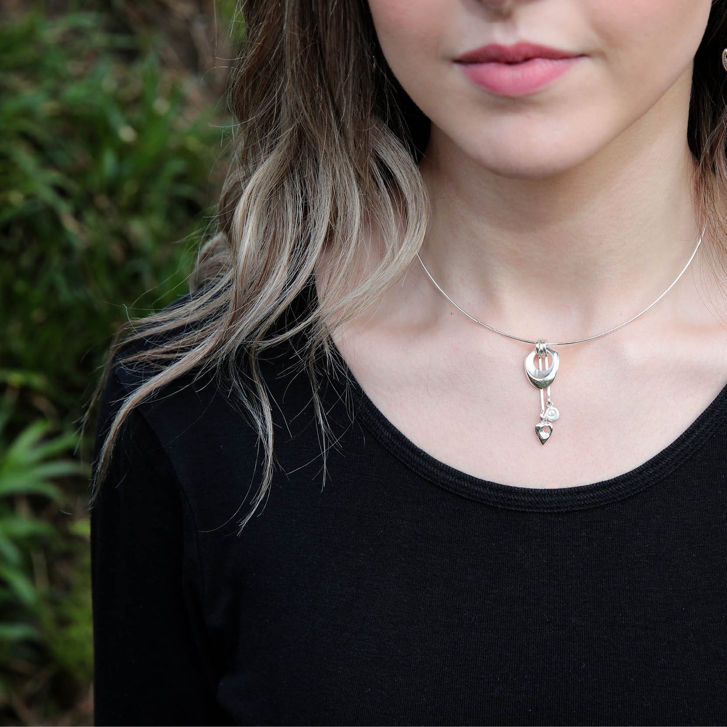 Crest Neckwire in Silver on a model- Aurora Orkney Jewellery, Orkney, Scotland