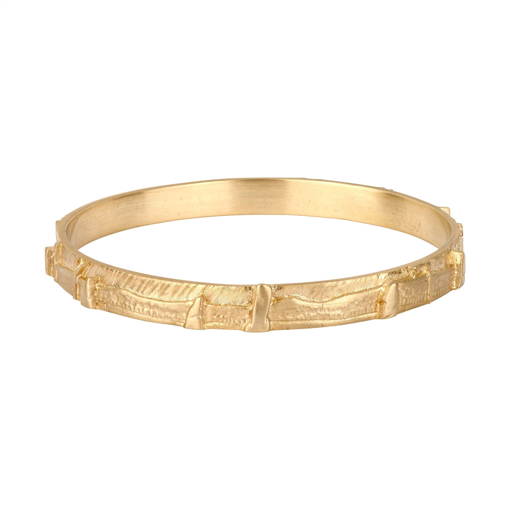 Based on the Craigh na Dun stone circle featured in the Outlander TV series,  This celtic jewelry bangle in 9ct gold, by Aurora Jewellery Orkney, Scotland