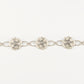 Outlander Rose Coin Collection Bracelet on a white background by Aurora Jewellery, Orkney, Scotland