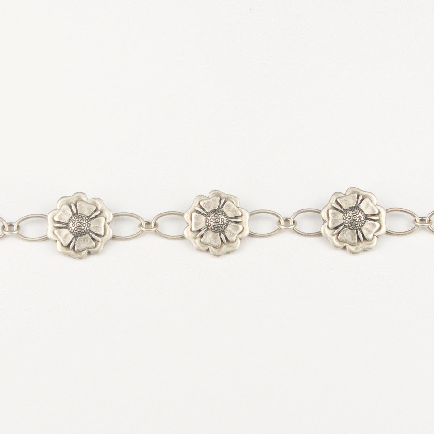 Outlander Rose Coin Collection Bracelet on a white background by Aurora Jewellery, Orkney, Scotland