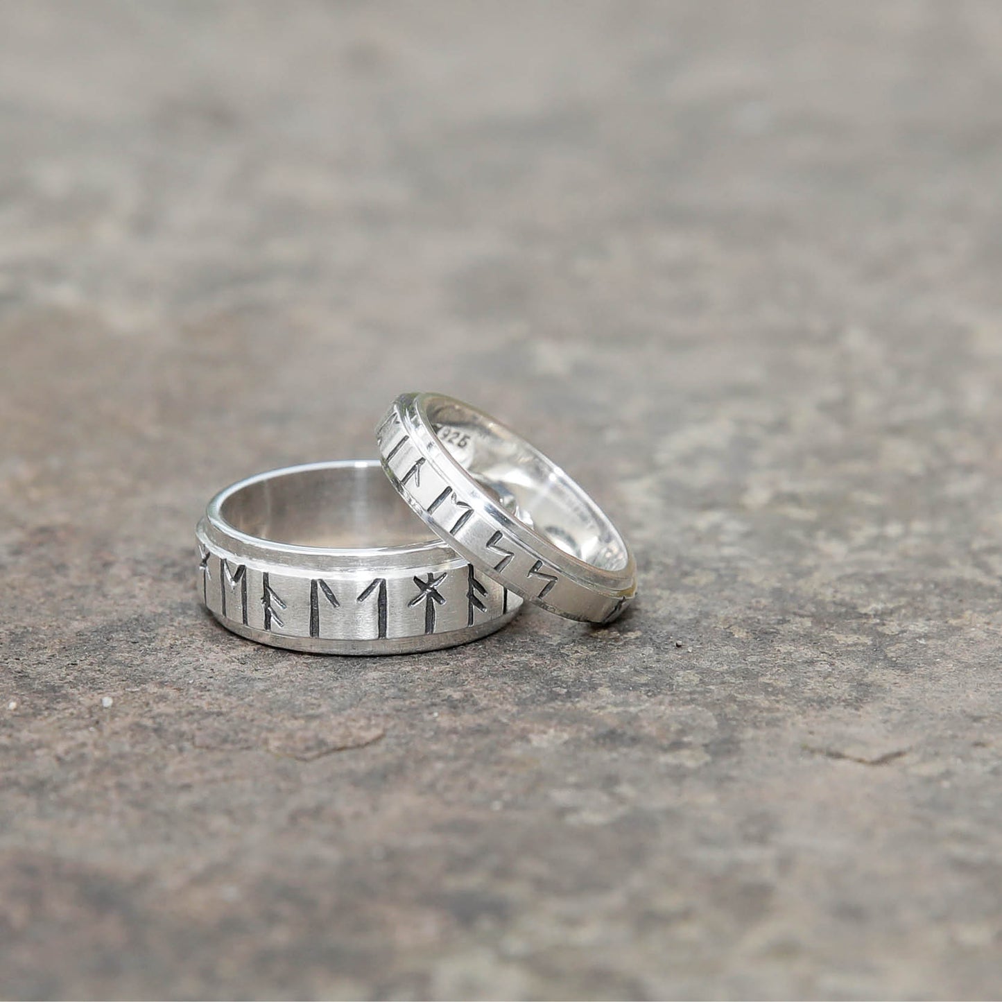 Runic Ring 6mm Silver Ring 16032-2 - Displayed on stone, Aurora Orkney Jewellery, Scotland, Orkney