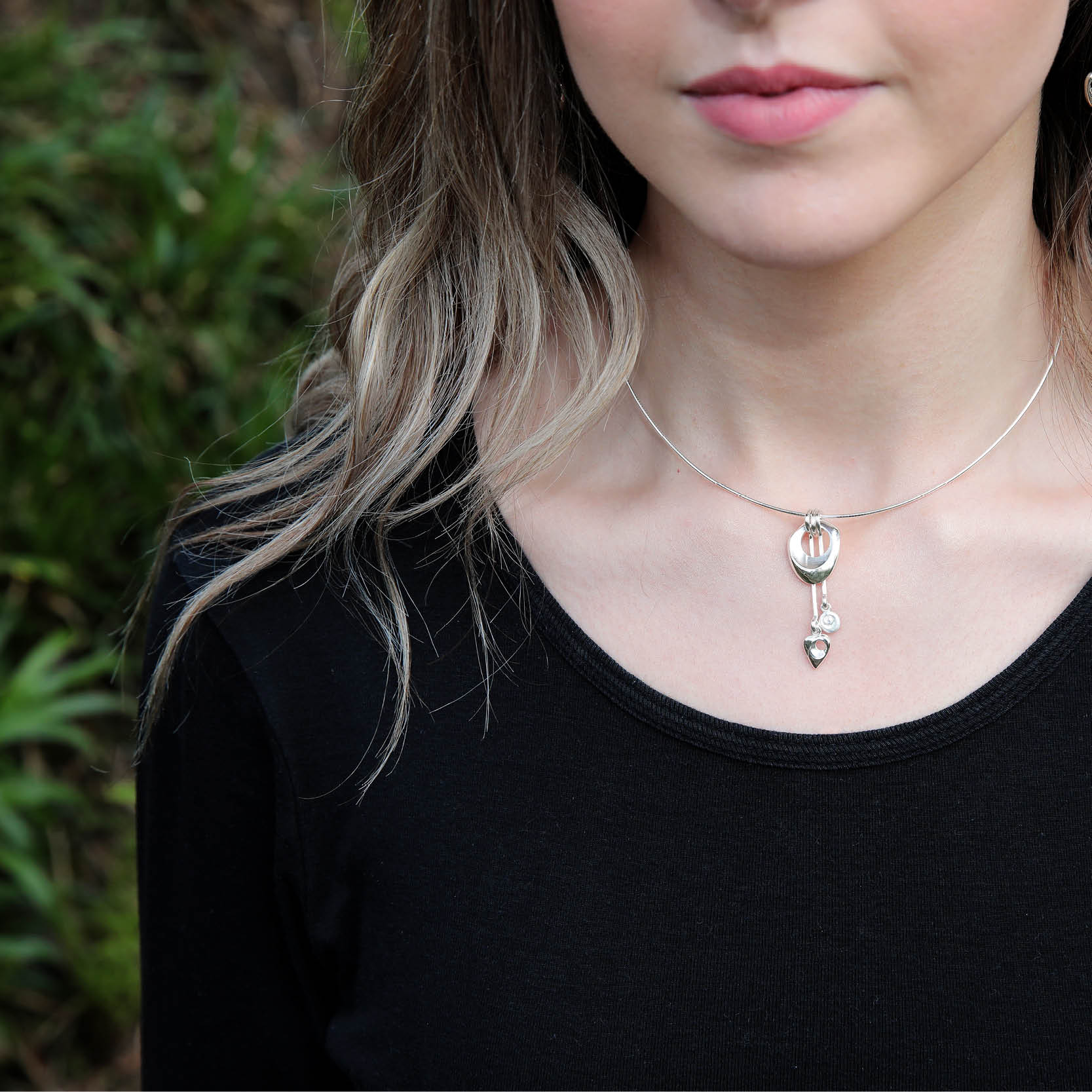 Crest Neckwire in Silver on a model- Aurora Orkney Jewellery, Orkney, Scotland