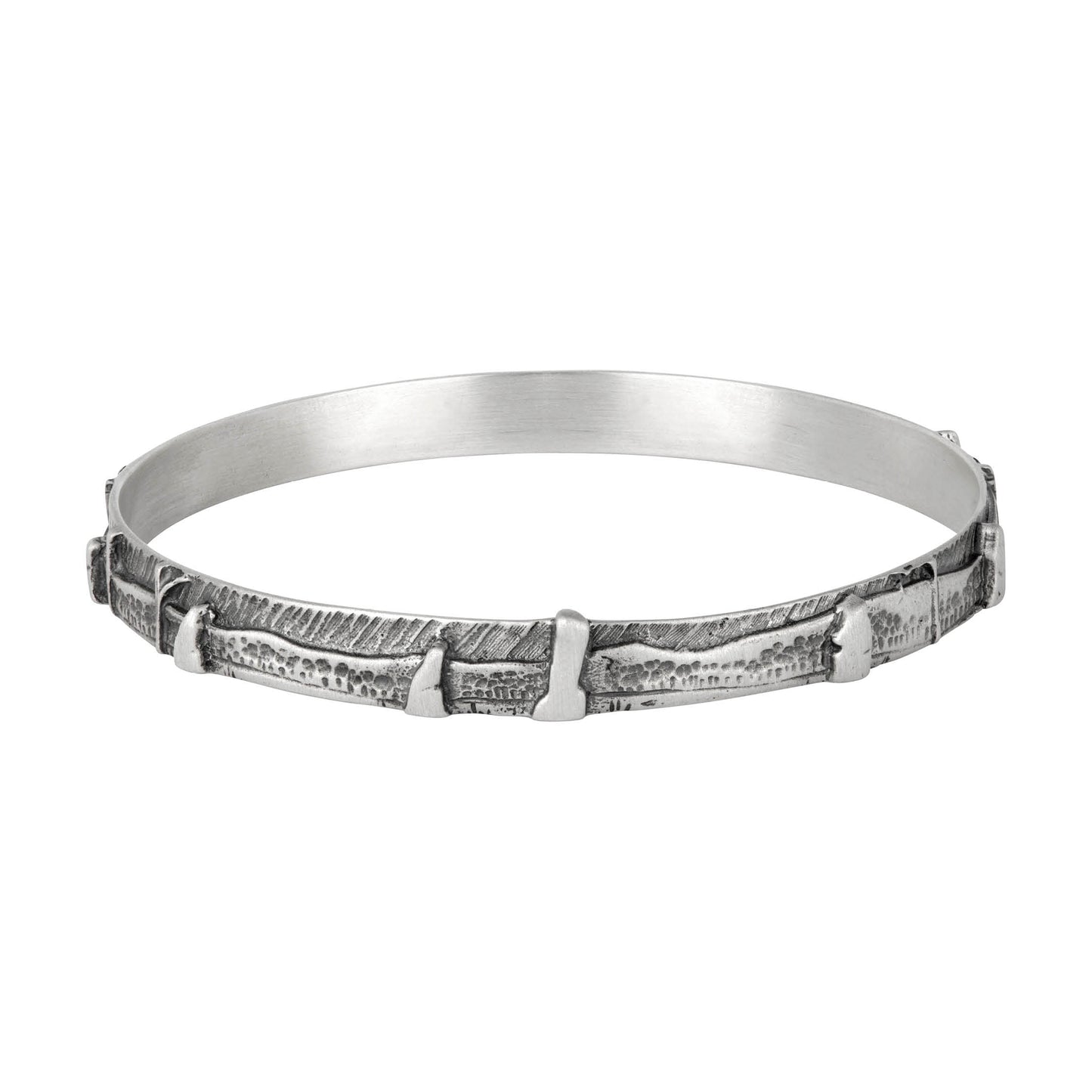 Based on the Craigh na Dun stone circle featured in the Outlander TV series,  This celtic jewelry bangle in sterling silver, by Aurora Jewellery Orkney, Scotland